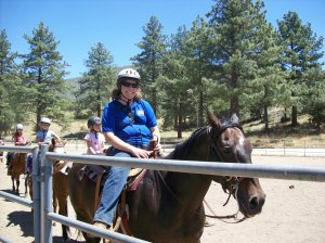 Me riding Charlie, a very tall horse.
